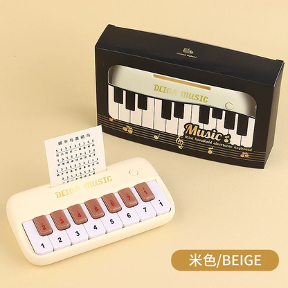 Beige electronic piano; batteries not included