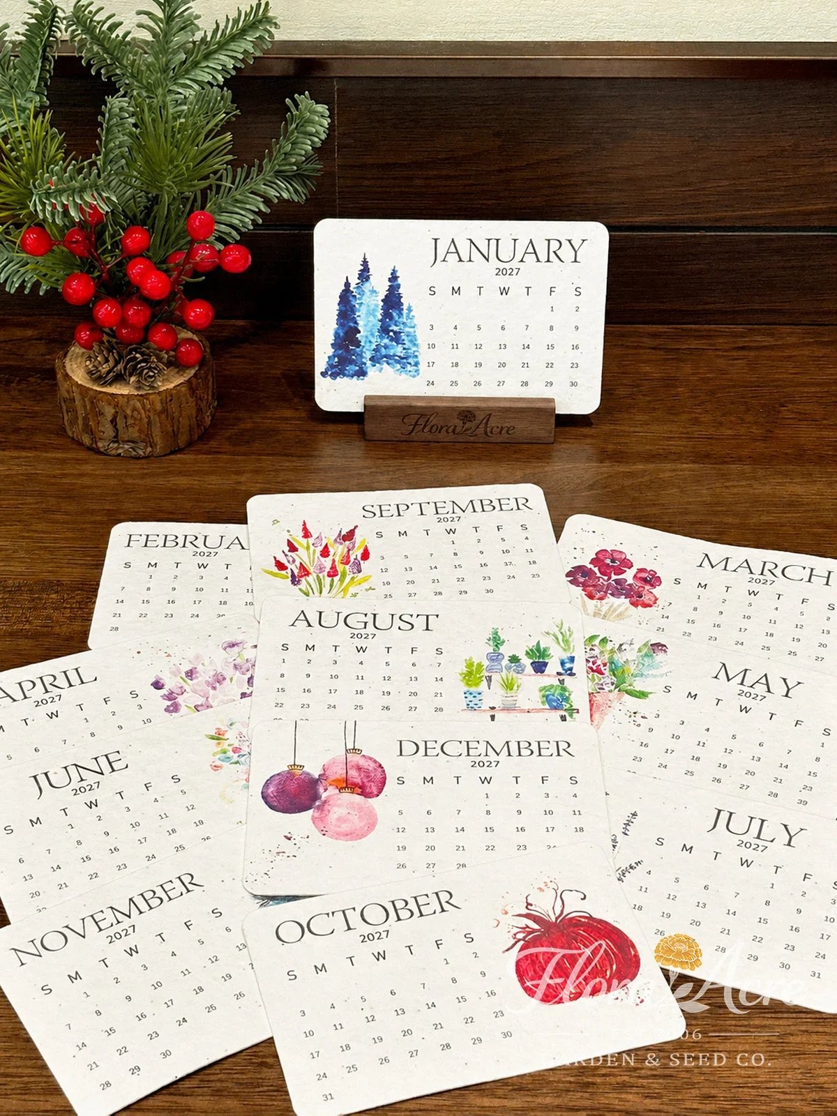 All twelve watercolor-style 2027 monthly calendar cards