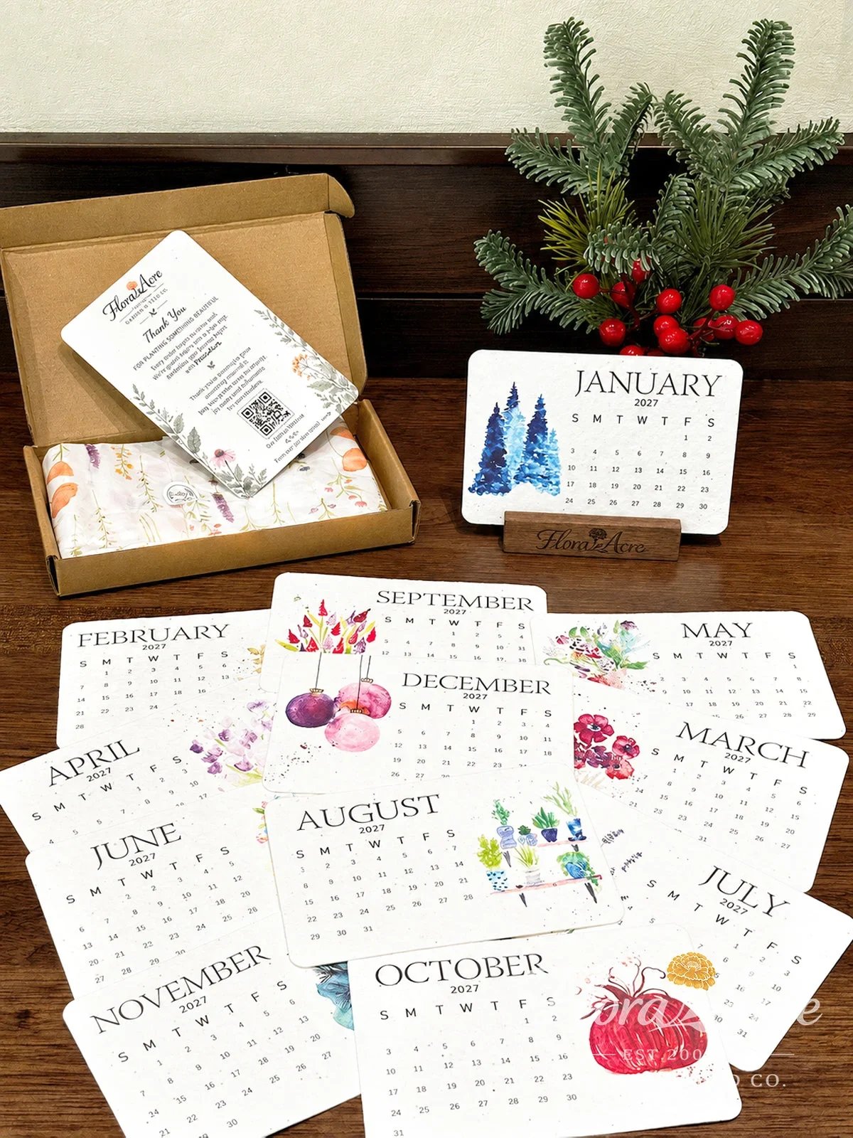 Calendar cards and the printed planting guide arranged beside the box