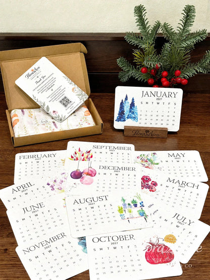 Calendar cards and the printed planting guide arranged beside the box